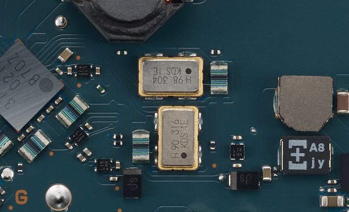 Circuit board featuring crystal oscillators