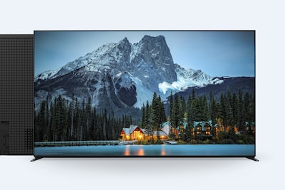 An image showing the front and back photos of a Bravia TV. On the LCD screen of the front photo, there is an image of a large mountain with a house at its base.