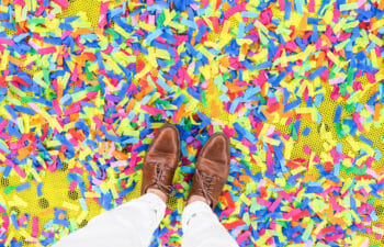 Shoes on a confetti-filled floor