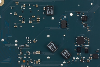 Circuit board featuring high polymer capacitors