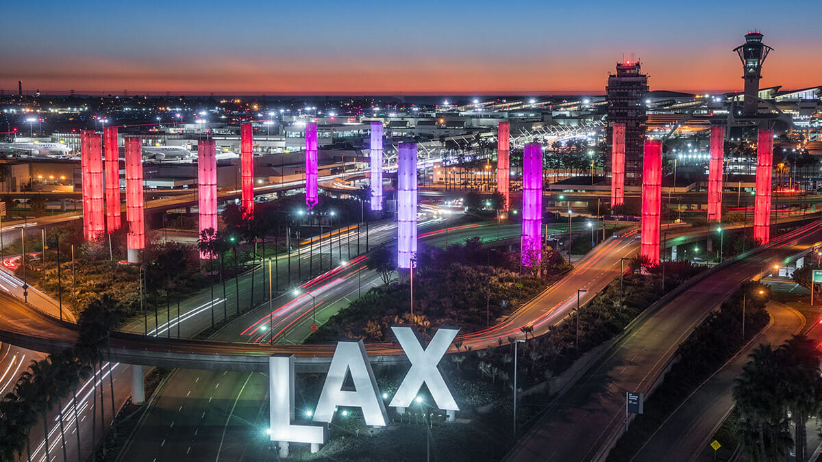 Aerial view of Los Angeles Airport Gateway with large purple and red lights